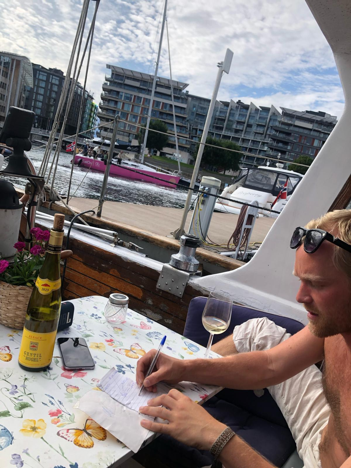 William writing songs on deck