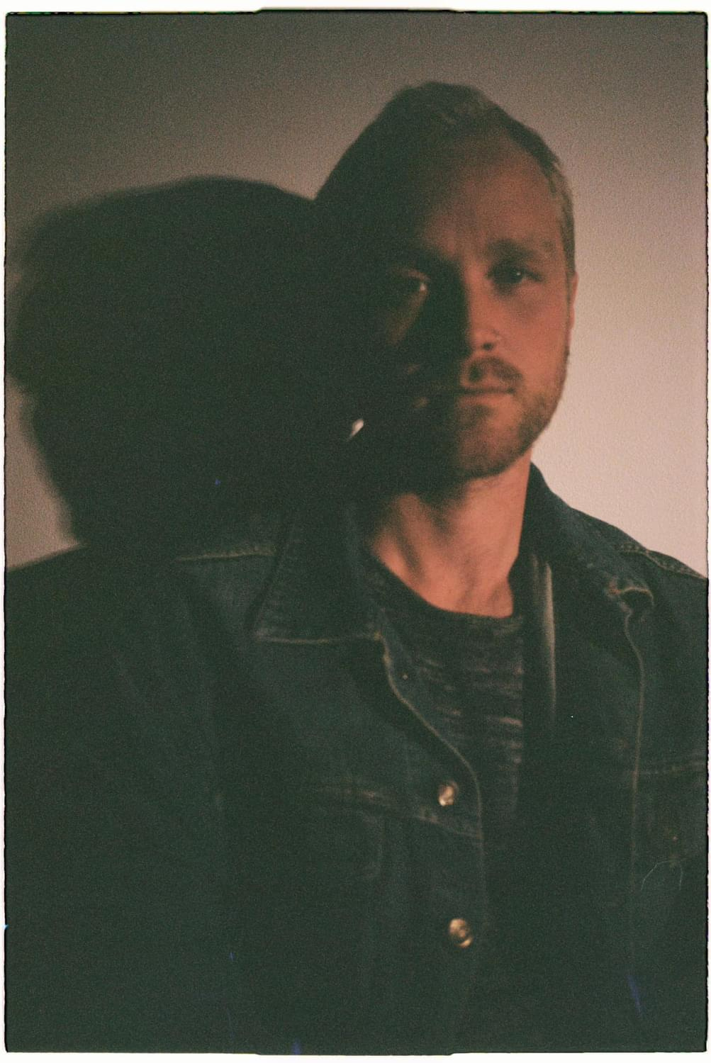 Press photo — dark portrait