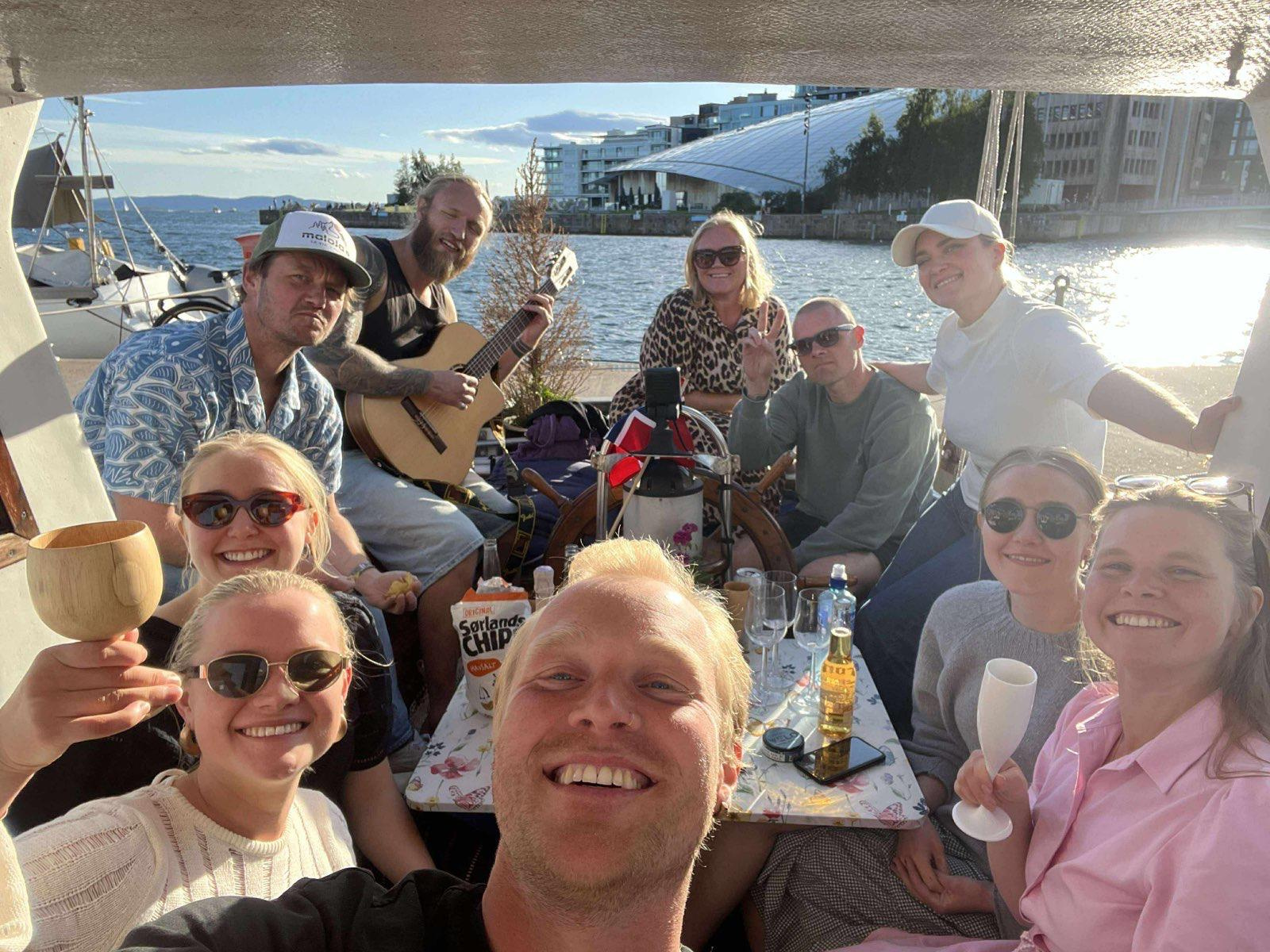 Friends gathering on the deck of Tingeling