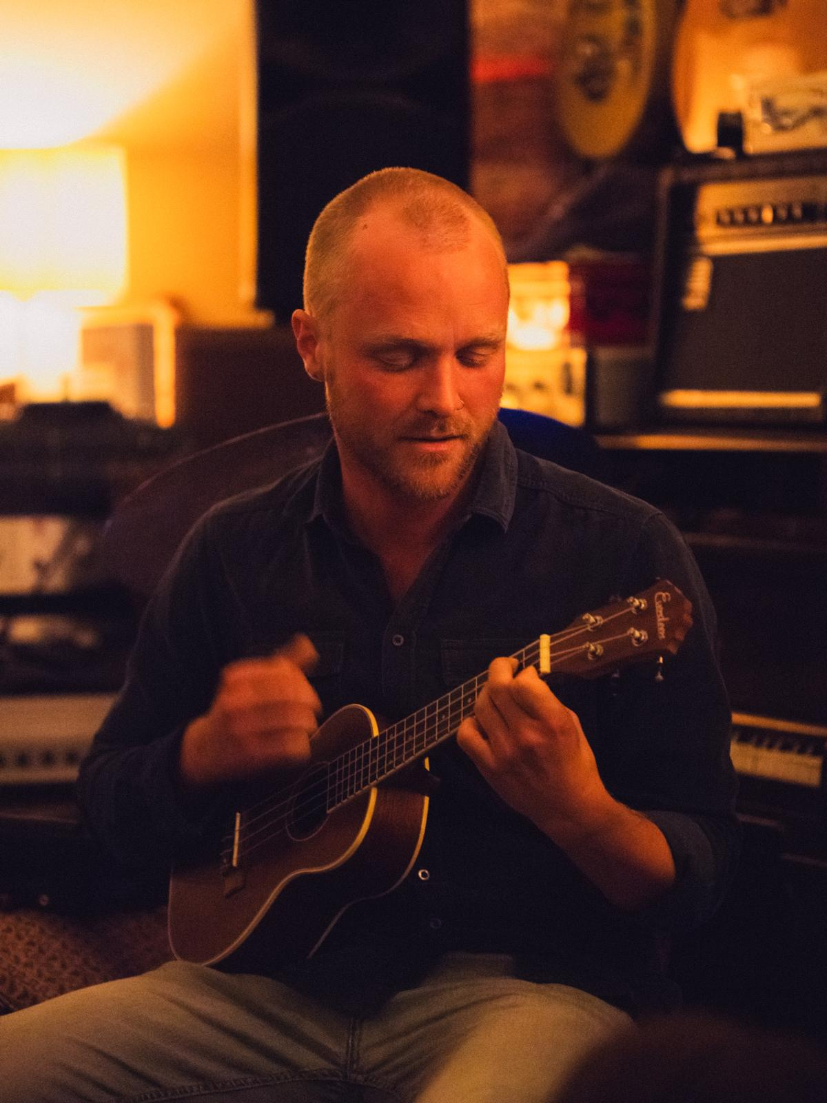 William playing guitar